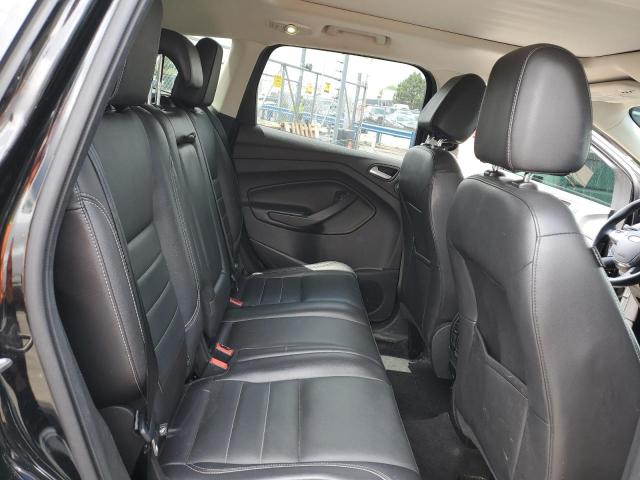 Photo 11 from auction – 2016 FORD ESCAPE TIT with VIN 1FMCU9J97GUC11195