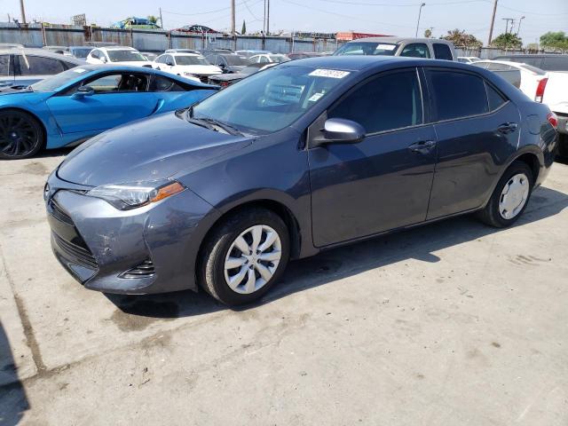 TOYOTA COROLLA L 2015 with VIN 5YFBURHE7FP276403 - Photo from auction