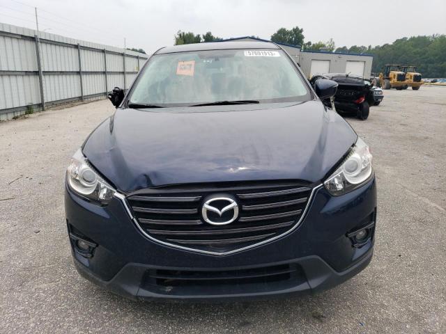 Photo 5 from auction – 2016 MAZDA CX-5 TOURI with VIN JM3KE2CY0G0695878