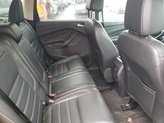 Photo 10 from auction – 2017 FORD ESCAPE SE with VIN 1FMCU9GD9HUA86763