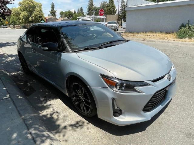 TOYOTA SCION TC 2014 with VIN JTKJF5C77E3074698 - Photo from auction