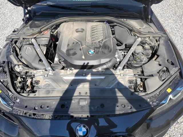 Photo 11 from auction – 2022 BMW M440I with VIN WBA83AP02NCH69157