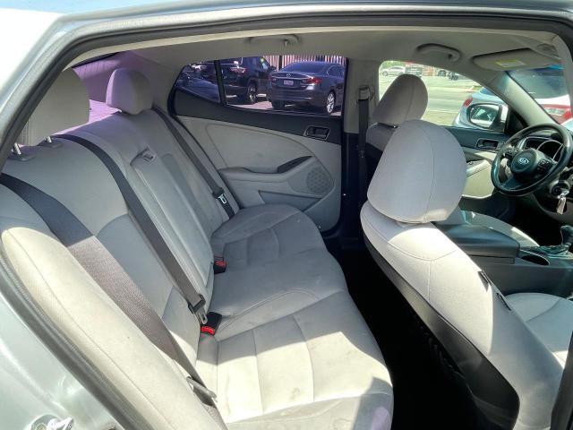Photo 6 from auction – 2014 KIA OPTIMA LX with VIN KNAGM4A71E5521354