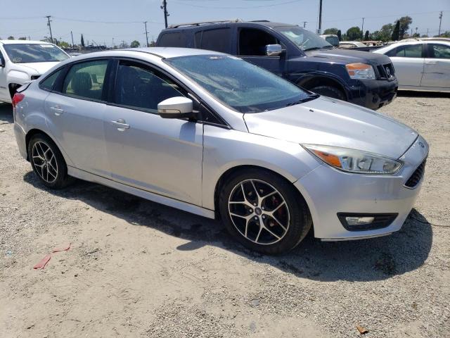 Photo 4 from auction – 2015 FORD FOCUS SE with VIN 1FADP3F27FL211524