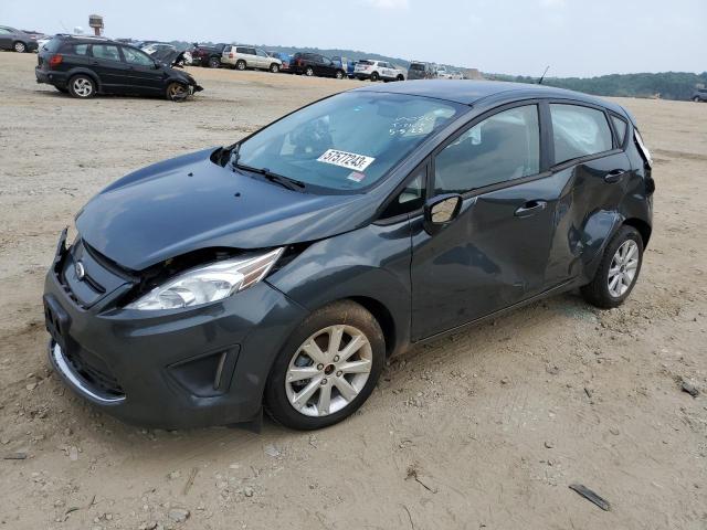FORD FIESTA SE 2011 with VIN 3FADP4EJ9BM150863 - Photo from auction