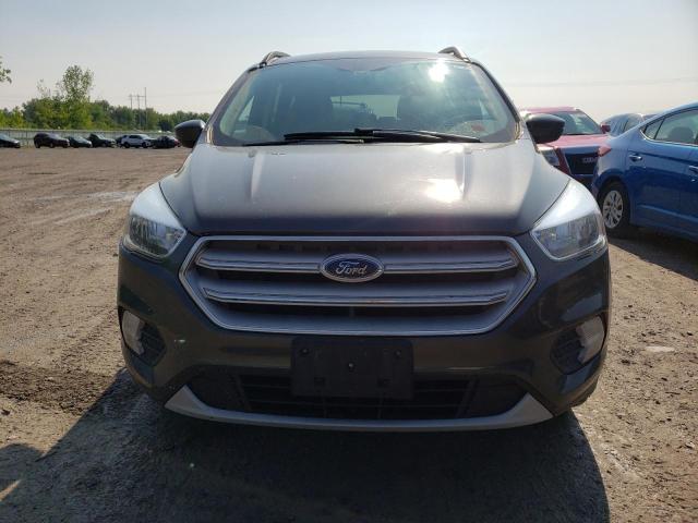 Photo 5 from auction – 2018 FORD ESCAPE SE with VIN 1FMCU9GD5JUA38943