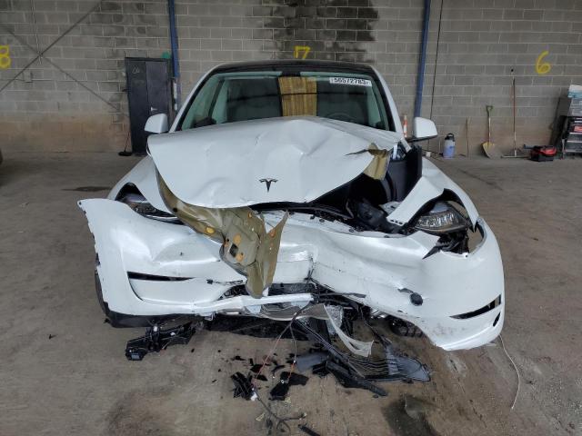 Photo 5 from auction – 2023 TESLA MODEL Y with VIN 7SAYGDEE8PA124717