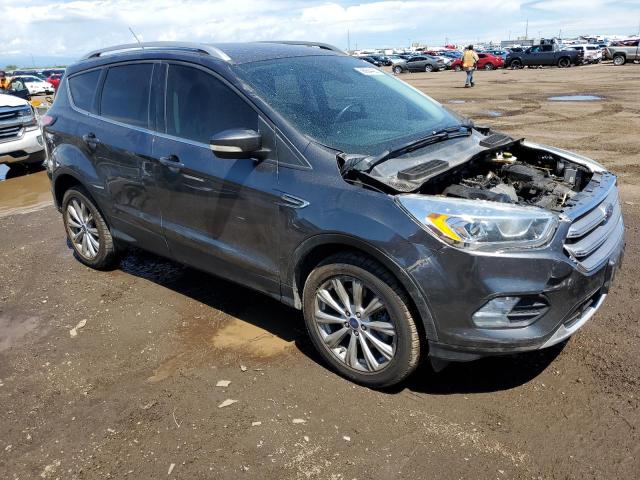 Photo 4 from auction – 2017 FORD ESCAPE TIT with VIN 1FMCU9J98HUD85035