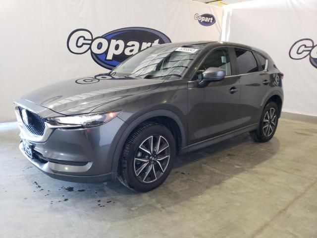 MAZDA CX-5 TOURI 2018 with VIN JM3KFACM9J1394886 - Photo from auction