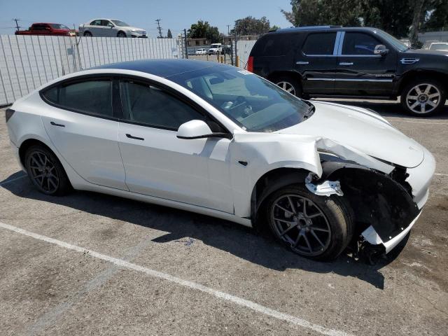Photo 4 from auction – 2022 TESLA MODEL 3 with VIN 5YJ3E1EAXNF290102