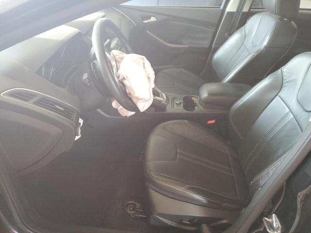 Photo 7 from auction – 2014 FORD FOCUS with VIN 1FADP3J27EL416380
