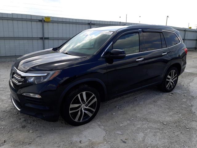 HONDA PILOT TOUR 2016 with VIN 5FNYF6H92GB081456 - Photo from auction