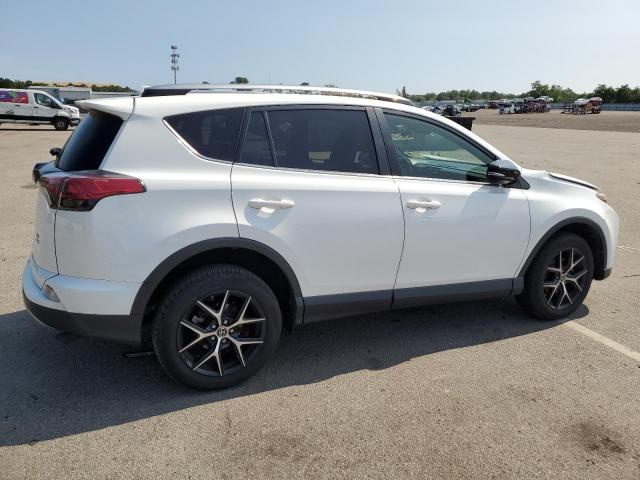 Photo 3 from auction – 2017 TOYOTA RAV4 SE with VIN JTMJFREV8HD219000