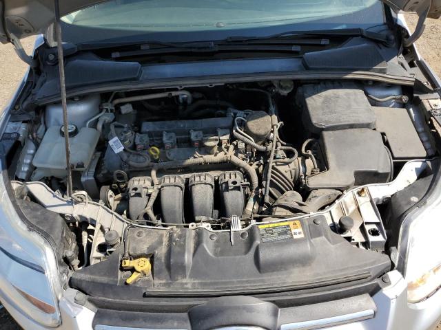 Photo 11 from auction – 2013 FORD FOCUS SE with VIN 1FADP3K22DL104254
