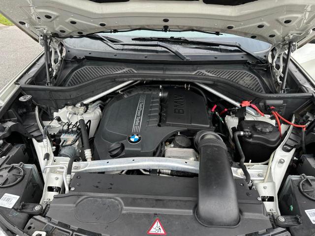 Photo 7 from auction – 2014 BMW X5 SDRIVE3 with VIN 5UXKR2C53E0C00168