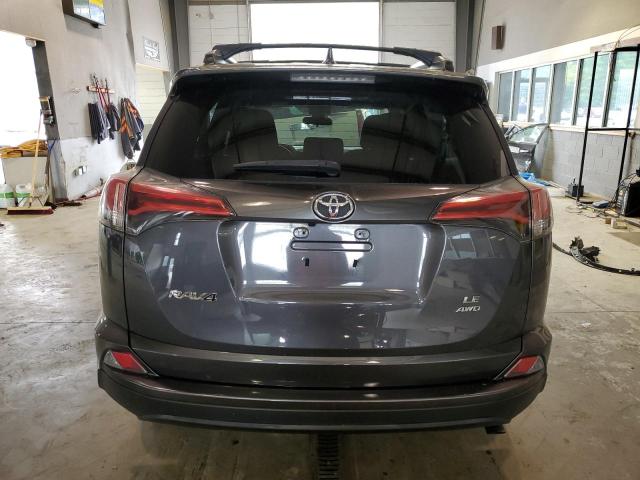 Photo 6 from auction – 2018 TOYOTA RAV4 LE with VIN 2T3BFREV3JW852226