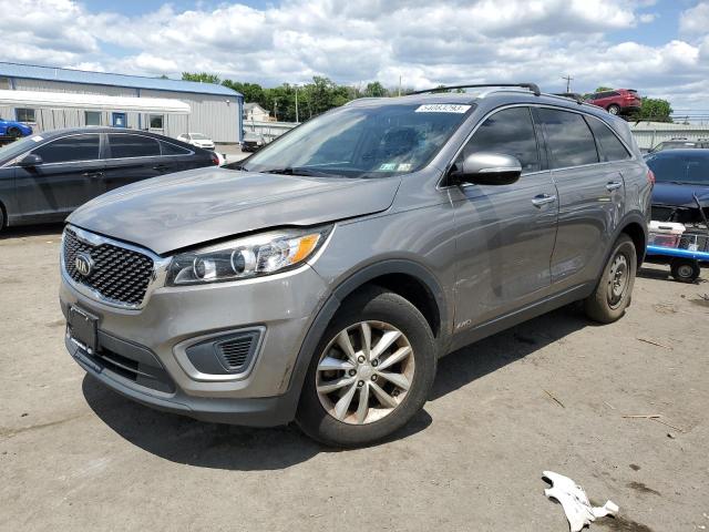 KIA SORENTO LX 2016 with VIN 5XYPGDA34GG059163 - Photo from auction