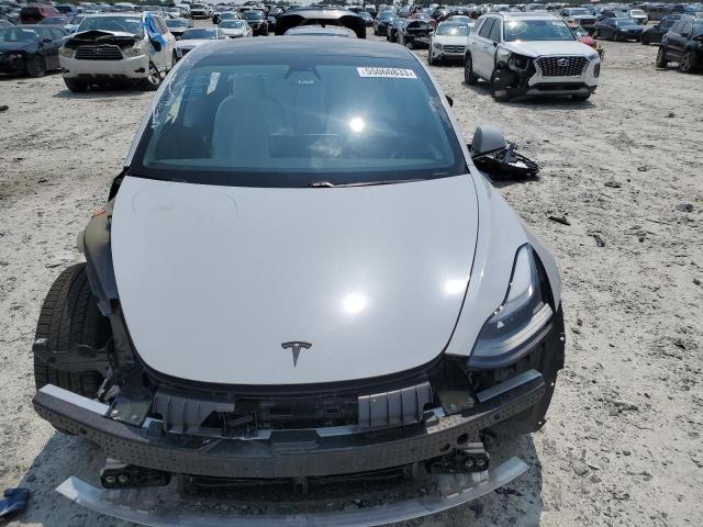 Photo 5 from auction – 2021 TESLA MODEL 3 with VIN 5YJ3E1EB5MF015583