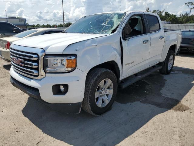 GMC CANYON SLE 2016 with VIN 1GTG5CEAXG1375384 - Photo from auction