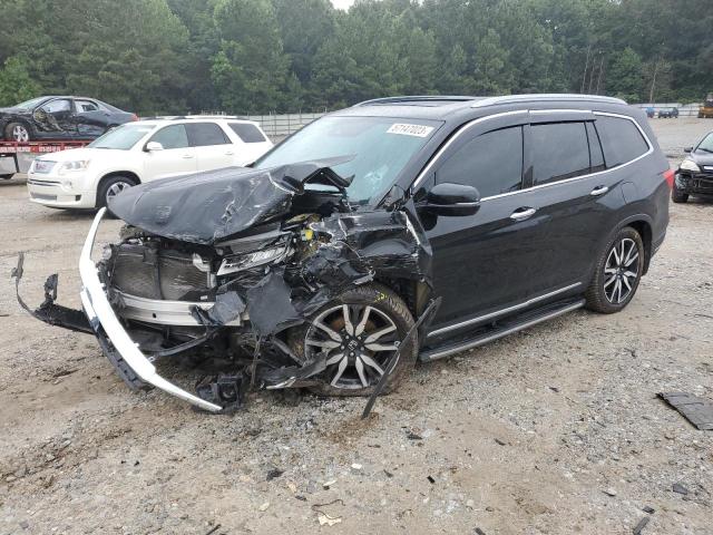 HONDA PILOT TOUR 2019 with VIN 5FNYF5H60KB025041 - Photo from auction
