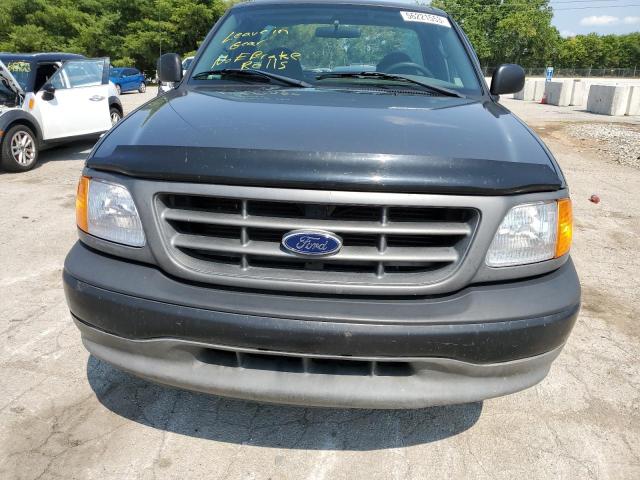 Photo 5 from auction – 2004 FORD F-150 HERI with VIN 2FTRF17264CA49821