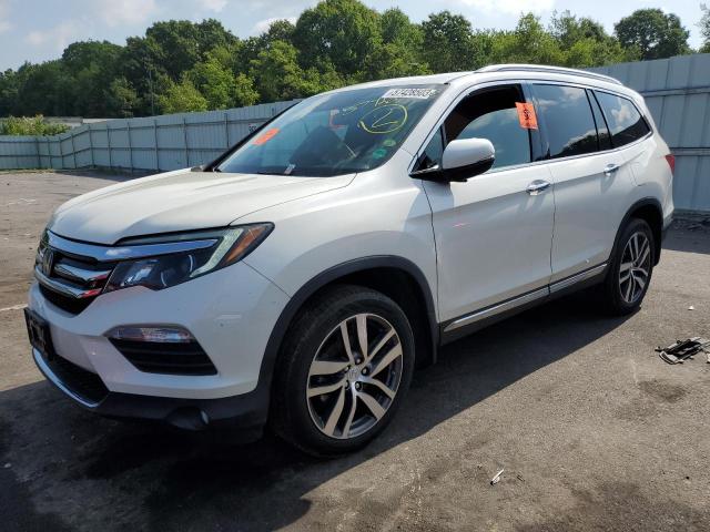 HONDA PILOT TOUR 2016 with VIN 5FNYF6H90GB066583 - Photo from auction