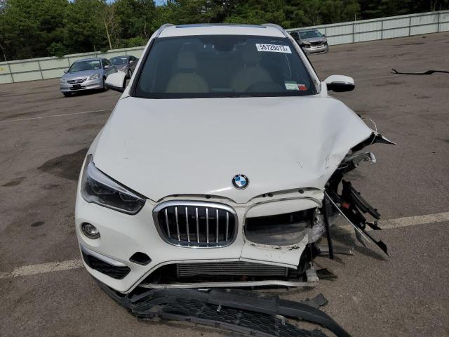 Photo 5 from auction – 2017 BMW X1 XDRIVE2 with VIN WBXHT3Z37H4A54477