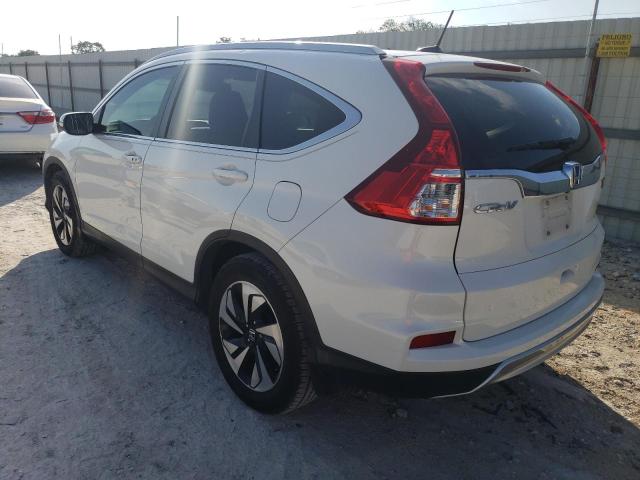 Photo 2 from auction – 2016 HONDA CR-V TOURI with VIN 5J6RM3H97GL021737