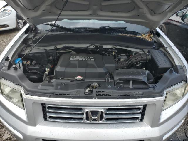 Photo 11 from auction – 2007 HONDA RIDGELINE with VIN 2HJYK16277H522265