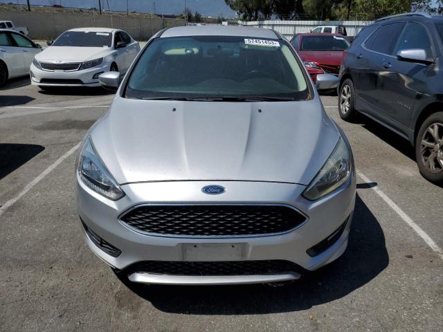 Photo 5 from auction – 2015 FORD FOCUS SE with VIN 1FADP3K29FL221025