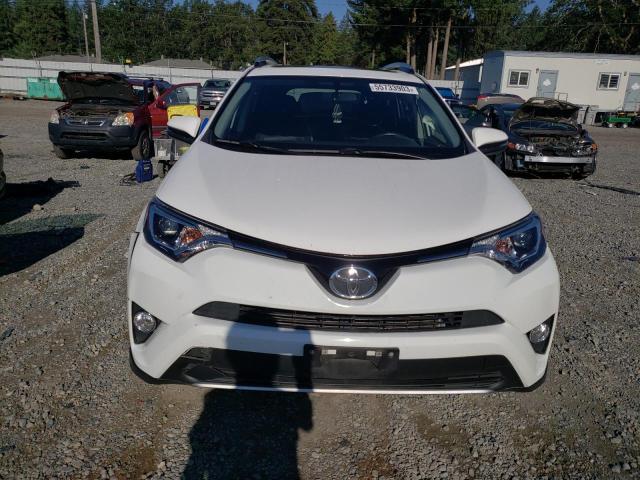 Photo 5 from auction – 2016 TOYOTA RAV4 XLE with VIN JTMRFREV9GJ101153