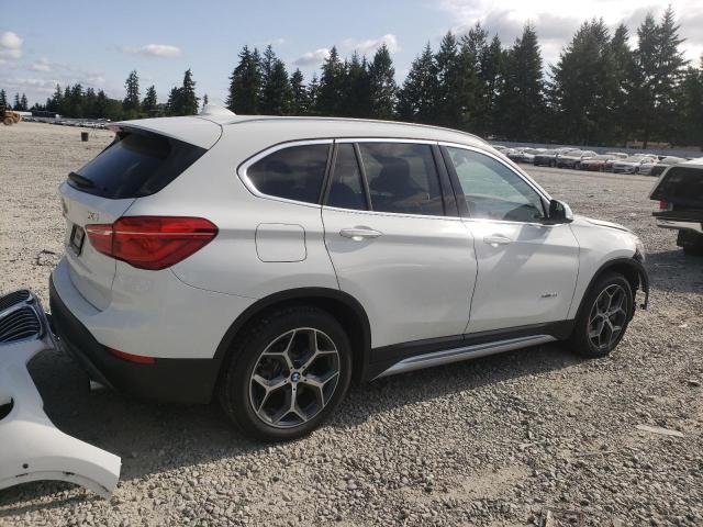 Photo 3 from auction – 2017 BMW X1 XDRIVE2 with VIN WBXHT3C33H5F83721
