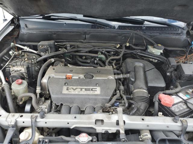 Photo 12 from auction – 2005 HONDA CR-V LX with VIN JHLRD68575C013223