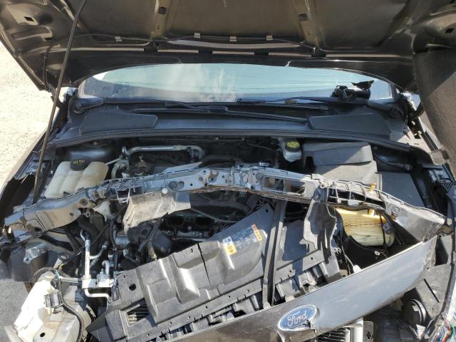 Photo 11 from auction – 2018 FORD FOCUS S with VIN 1FADP3E24JL275191