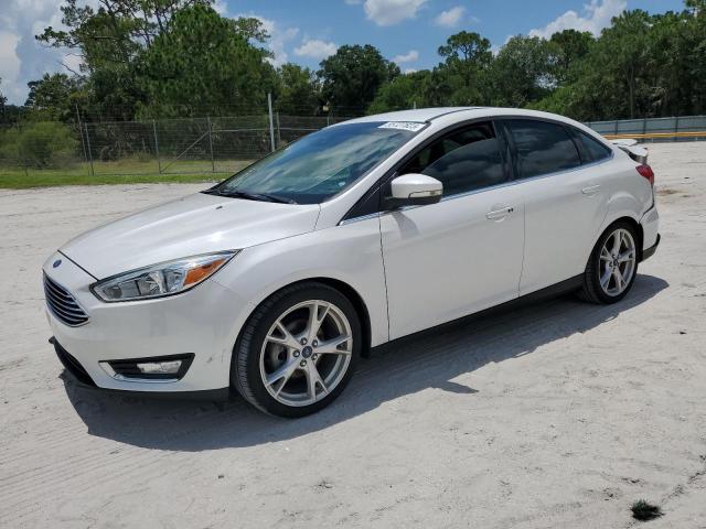 FORD FOCUS TITA 2016 with VIN 1FADP3J25GL257068 - Photo from auction