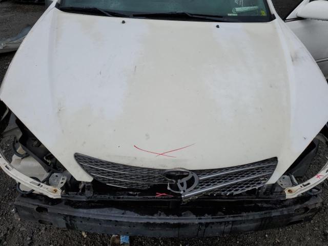 Photo 11 from auction – 2003 TOYOTA CAMRY LE with VIN 4T1BF32K03U050736