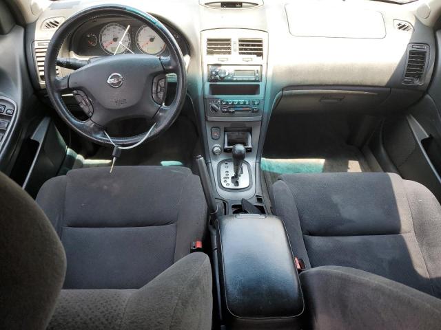 Photo 8 from auction – 2002 NISSAN MAXIMA GLE with VIN JN1DA31D02T402512