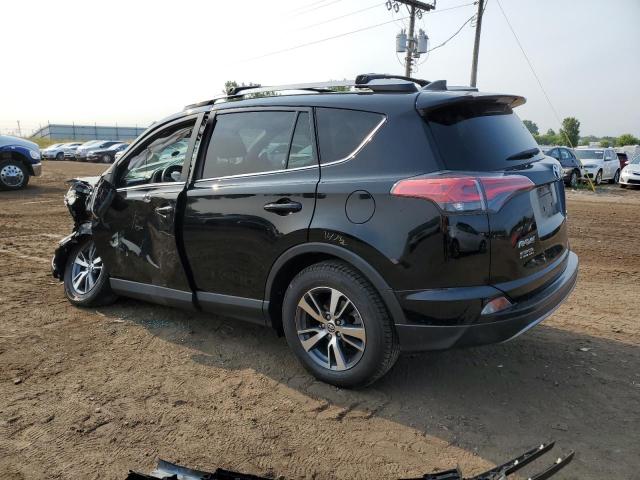 Photo 2 from auction – 2017 TOYOTA RAV4 XLE with VIN 2T3RFREV5HW690818