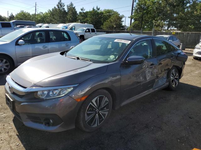 HONDA CIVIC EX 2017 with VIN 19XFC1F36HE012679 - Photo from auction