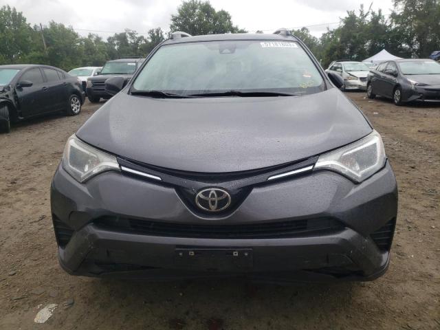Photo 5 from auction – 2017 TOYOTA RAV4 LE with VIN JTMZFREV8HJ707867