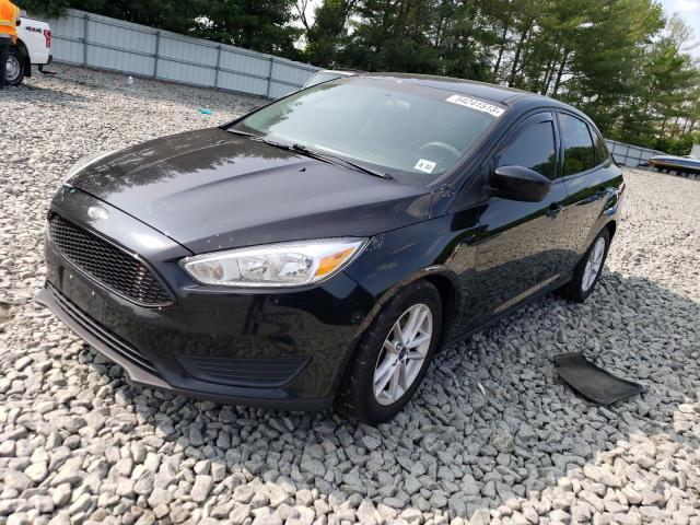 FORD FOCUS SE 2018 with VIN 1FADP3F24JL329314 - Photo from auction