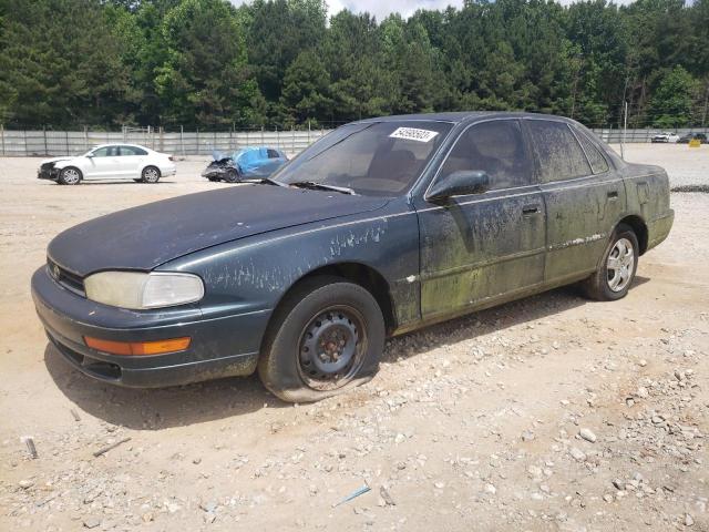 TOYOTA CAMRY LE 1994 with VIN 4T1SK12E2RU331858 - Photo from auction