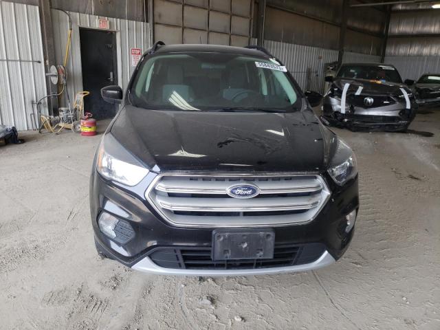 Photo 5 from auction – 2018 FORD ESCAPE SE with VIN 1FMCU9GD9JUC35341