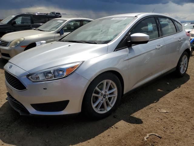 FORD FOCUS SE 2018 with VIN 1FADP3K26JL260504 - Photo from auction