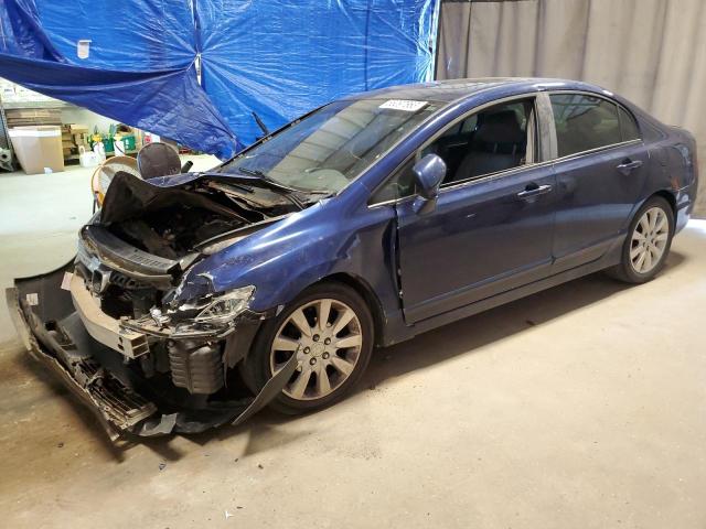 HONDA CIVIC EXL 2011 with VIN 19XFA1F94BE018983 - Photo from auction