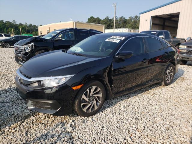 HONDA CIVIC EX 2018 with VIN 2HGFC2F74JH567523 - Photo from auction