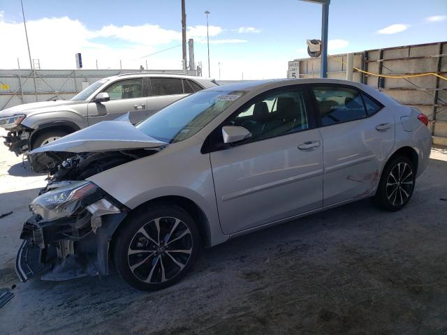 TOYOTA COROLLA L 2018 with VIN 5YFBURHE0JP745050 - Photo from auction