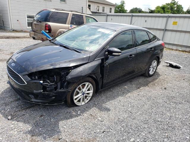 FORD FOCUS SE 2017 with VIN 1FADP3F2XHL218289 - Photo from auction