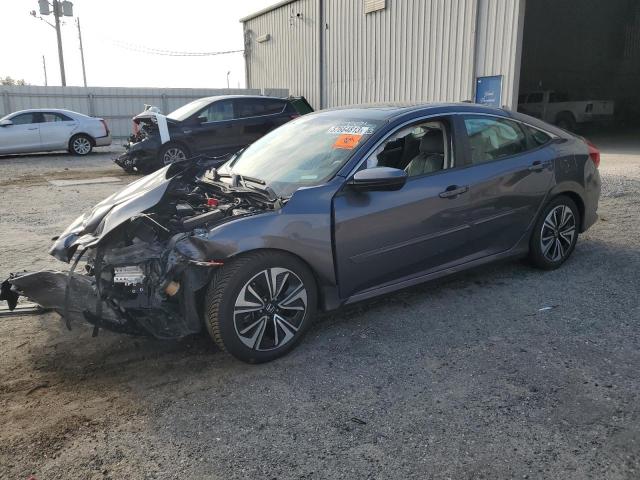 HONDA CIVIC EXL 2017 with VIN 19XFC1F79HE004398 - Photo from auction