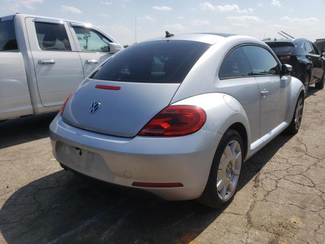 Photo 3 from auction – 2013 VOLKSWAGEN BEETLE with VIN 3VWJX7AT2DM676404